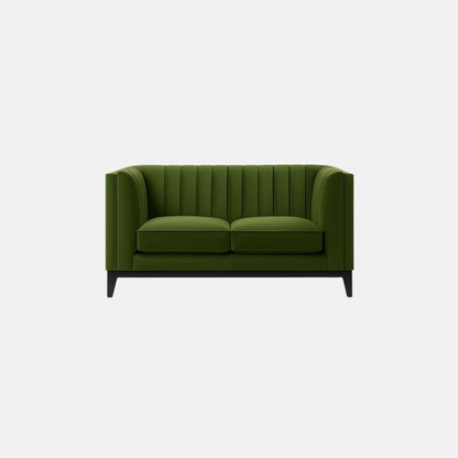This is a green upholstered sofa with vertical channel tufting along the back and sides. It features two seat cushions, a boxy frame, and a low-profile black wooden base with tapered legs. The overall design is sleek and contemporary, giving it a sophisticated yet minimalist look — perfect for modern commercial or hospitality interiors.
