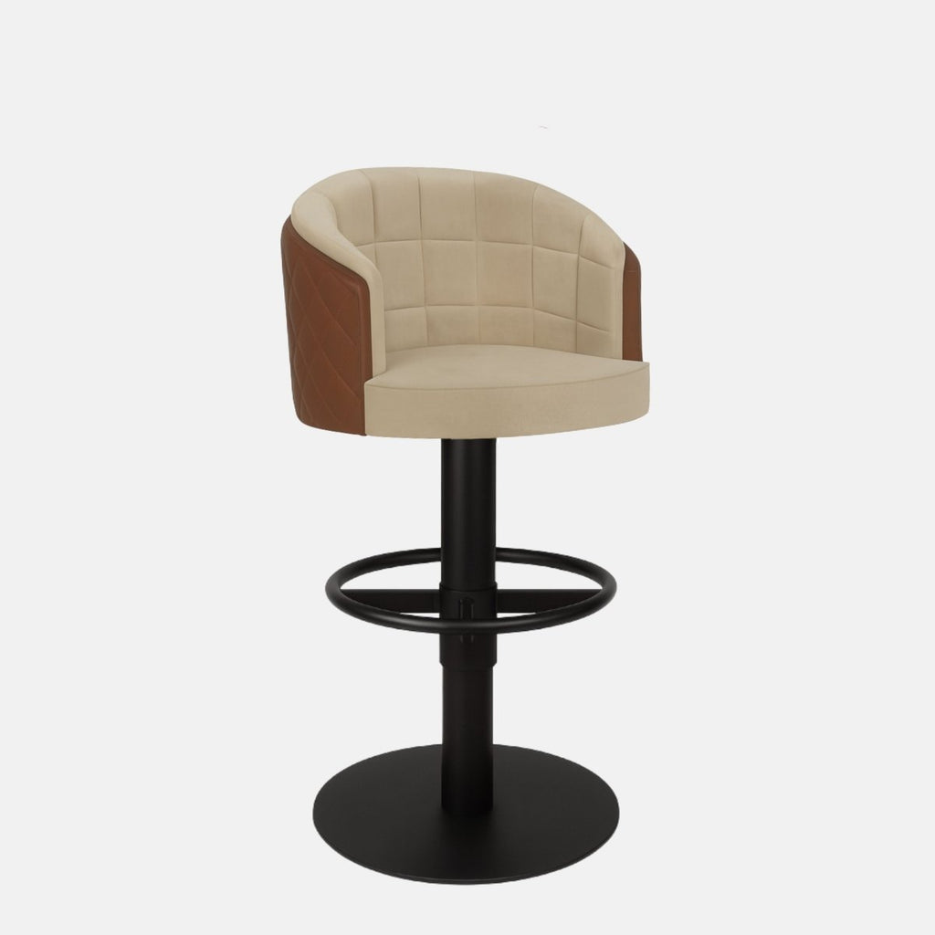 Two-tone beige and brown upholstered bar stool with quilted back, curved design, and black pedestal base with circular footrest.