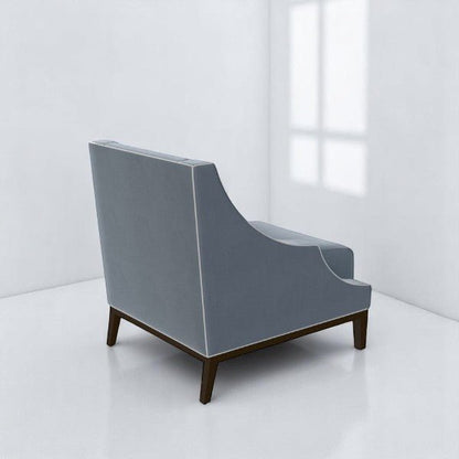 alt="Modern square accent lounge chair in grey with sleek black legs for a bold, contemporary look"