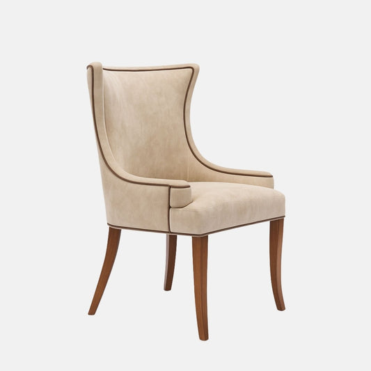 Upholstered wingback dining chair in soft beige fabric with gently curved arms, contrast piping, a cushioned seat, and dark wooden legs, shown on a white background