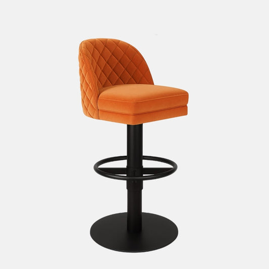 Orange velvet 360° swivel bar stool with quilted backrest and black powder-coated base — bespoke made-to-order counter stool for luxury kitchens and bars.