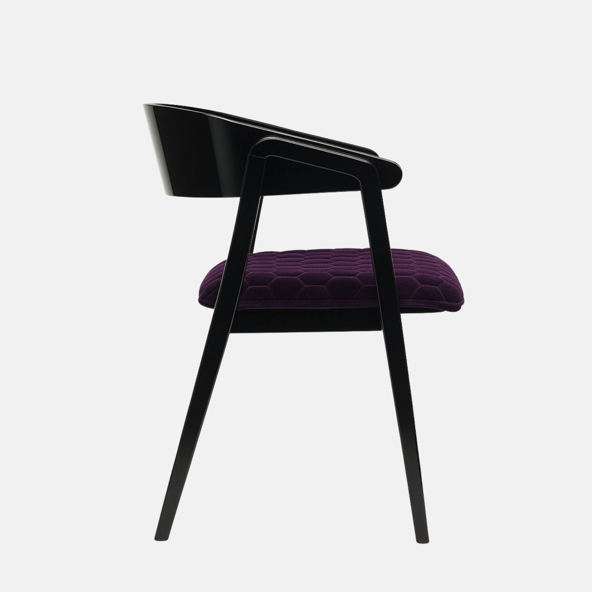 Stylish modern chair with a glossy black wooden frame and open curved backrest, featuring a deep purple velvet seat cushion with a geometric quilted pattern, set against a light grey background.