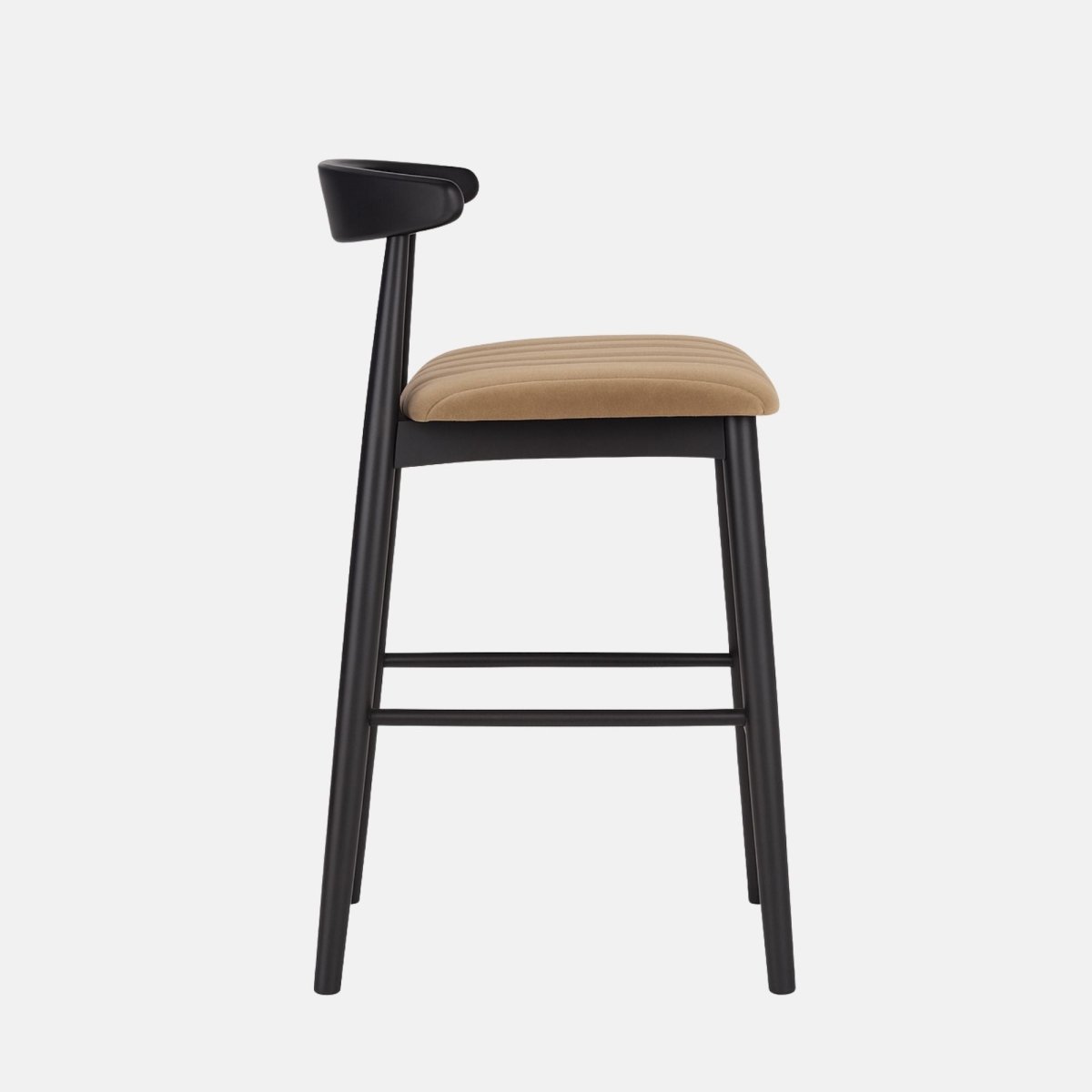 Modern bar stool with black wooden frame, curved low backrest, and tan upholstered cushioned seat with footrest.