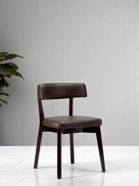 alt="Contemporary black wood side chair with smooth brown leather upholstery"