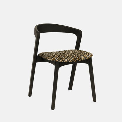 The Nina Stacking Dining Chair combines Scandinavian minimalist design with solid black oak and a patterned upholstered seat. This modern stackable dining chair is perfect for dining rooms, kitchens, cafés, or hospitality spaces, bringing Nordic and Japan style with lasting comfort and space-saving elegance
