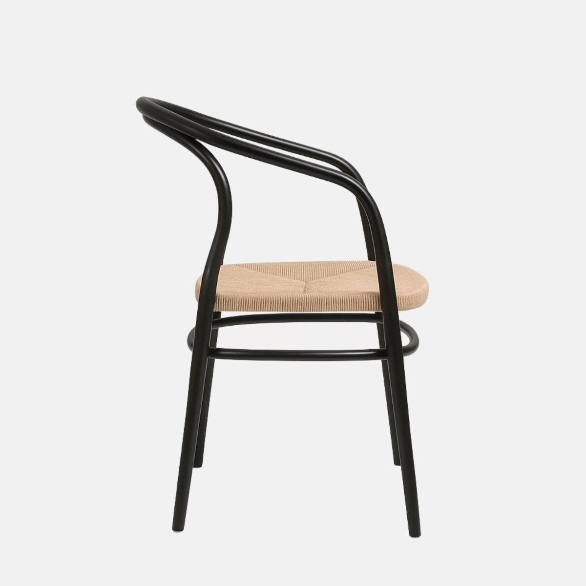 Modern armchair with a black curved metal frame and a woven natural rope seat.