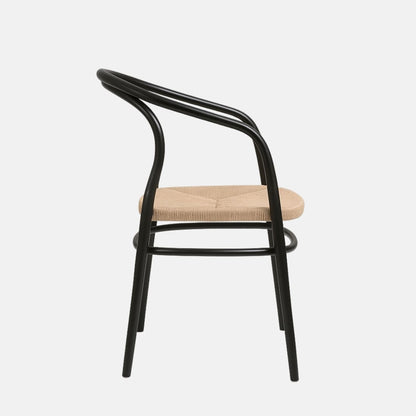 Modern armchair with a black curved metal frame and a woven natural rope seat.