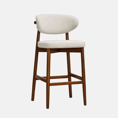Cream boucle bar stool with curved backrest and wooden frame, front angle view