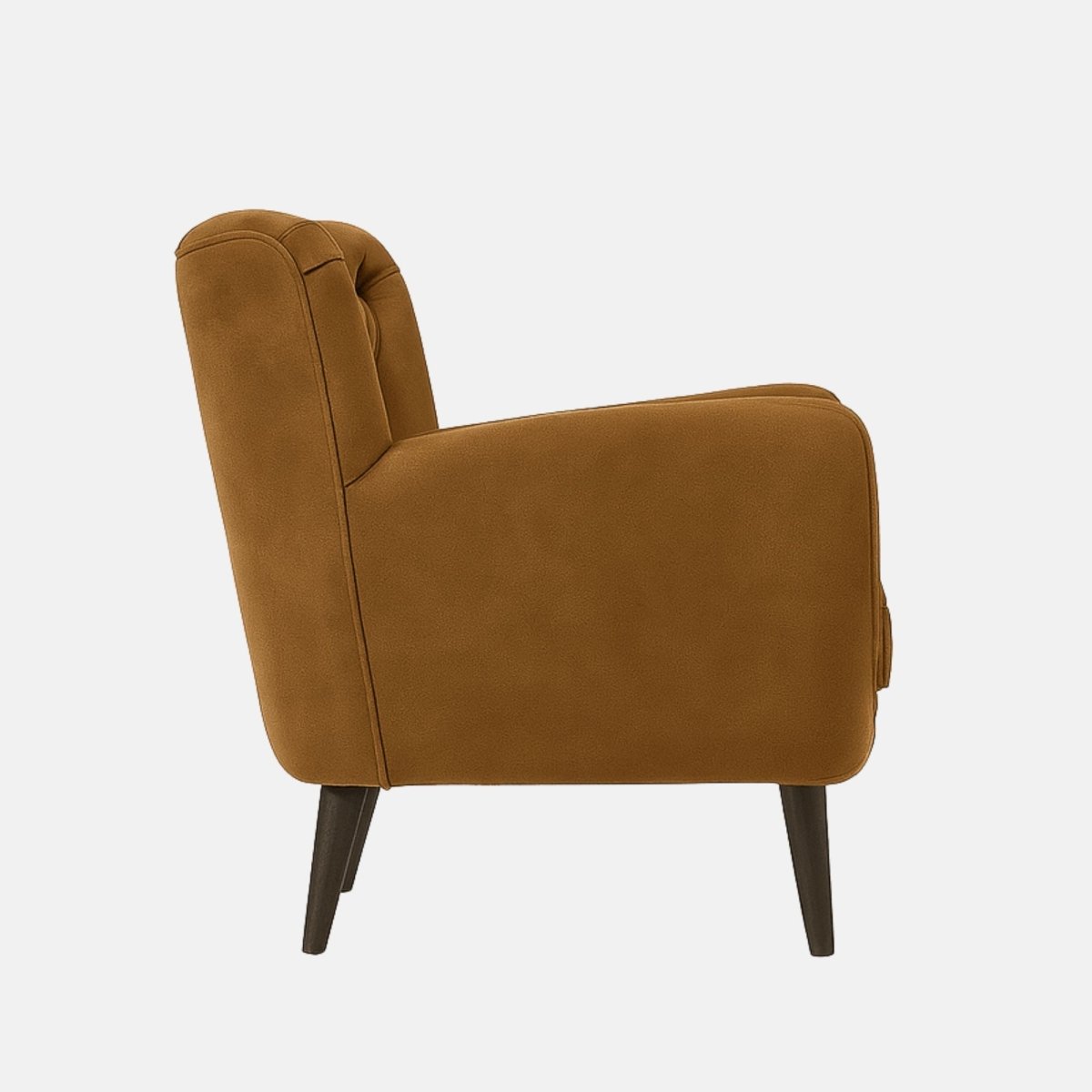 Mid-century modern armchair with mustard yellow tufted upholstery, rounded arms, cushioned seat, and tapered dark wooden legs.