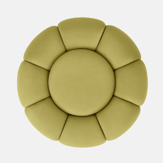 Light green velvet flower-shaped ottoman with petal-style upholstery and dark wood base modern statement footstool or coffee table for living room or hotel lounge.