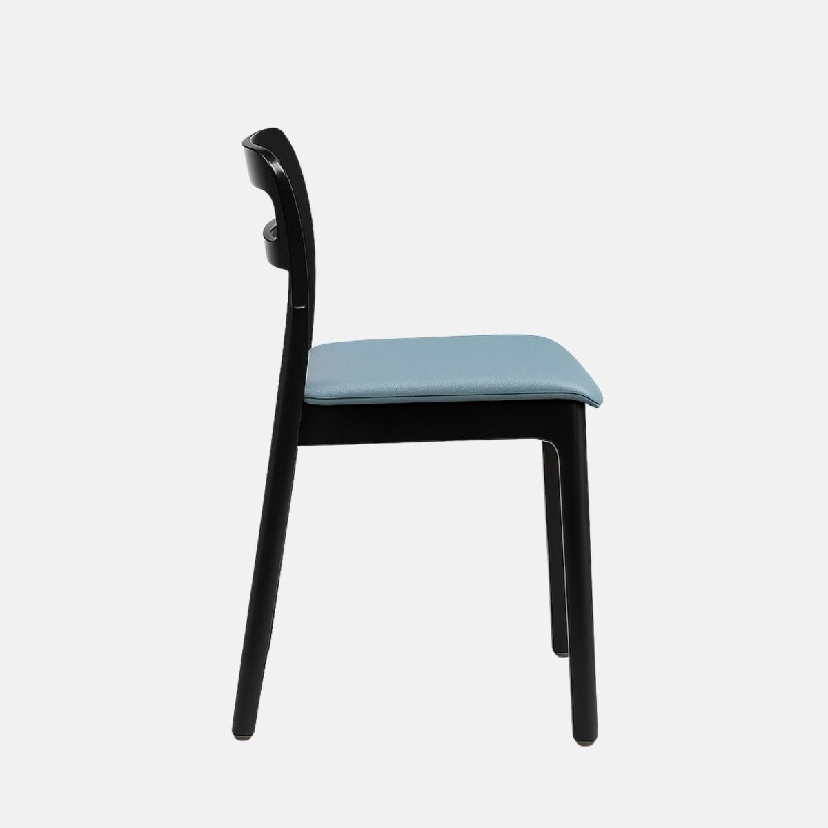 Contemporary dining chair with a black wooden frame and minimalist ladder-style backrest, featuring a light blue contoured seat, set against a light grey background