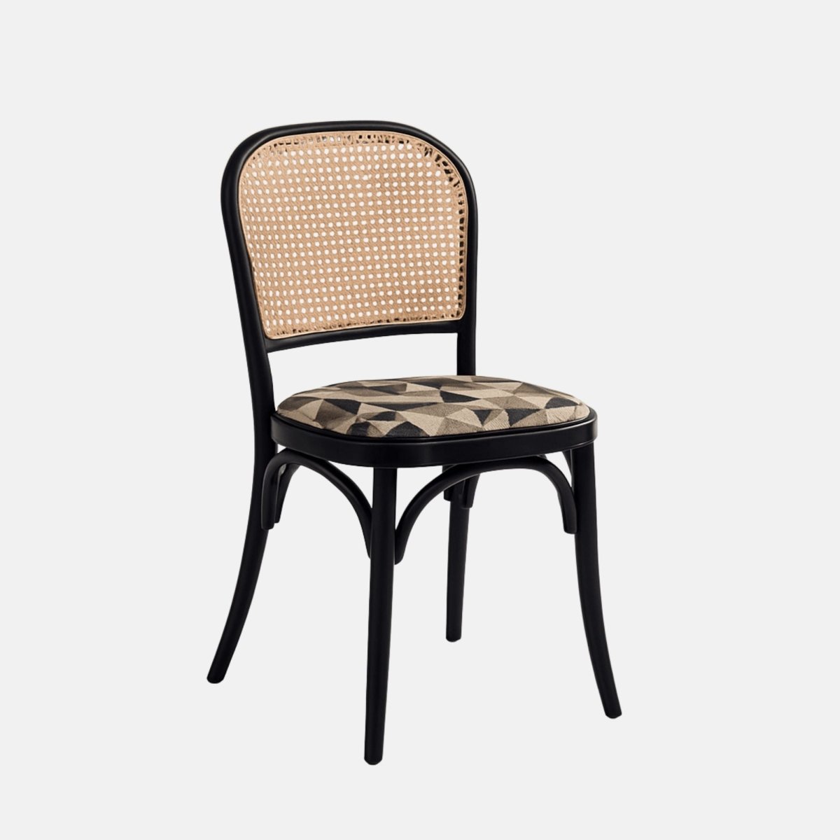 A black bentwood dining chair with a natural cane backrest and a cushioned seat upholstered in a beige and black geometric patterned fabric, shown from a straight side angle against a neutral background.
