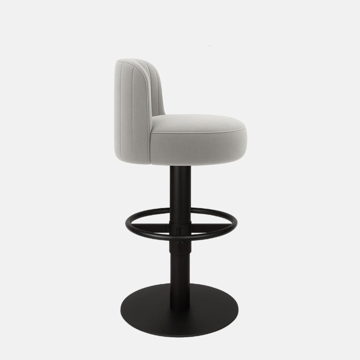 Light grey upholstered 360° swivel bar stool with curved low backrest, vertical stitching, and black powder-coated metal base — bespoke handmade counter stool for luxury interiors.
