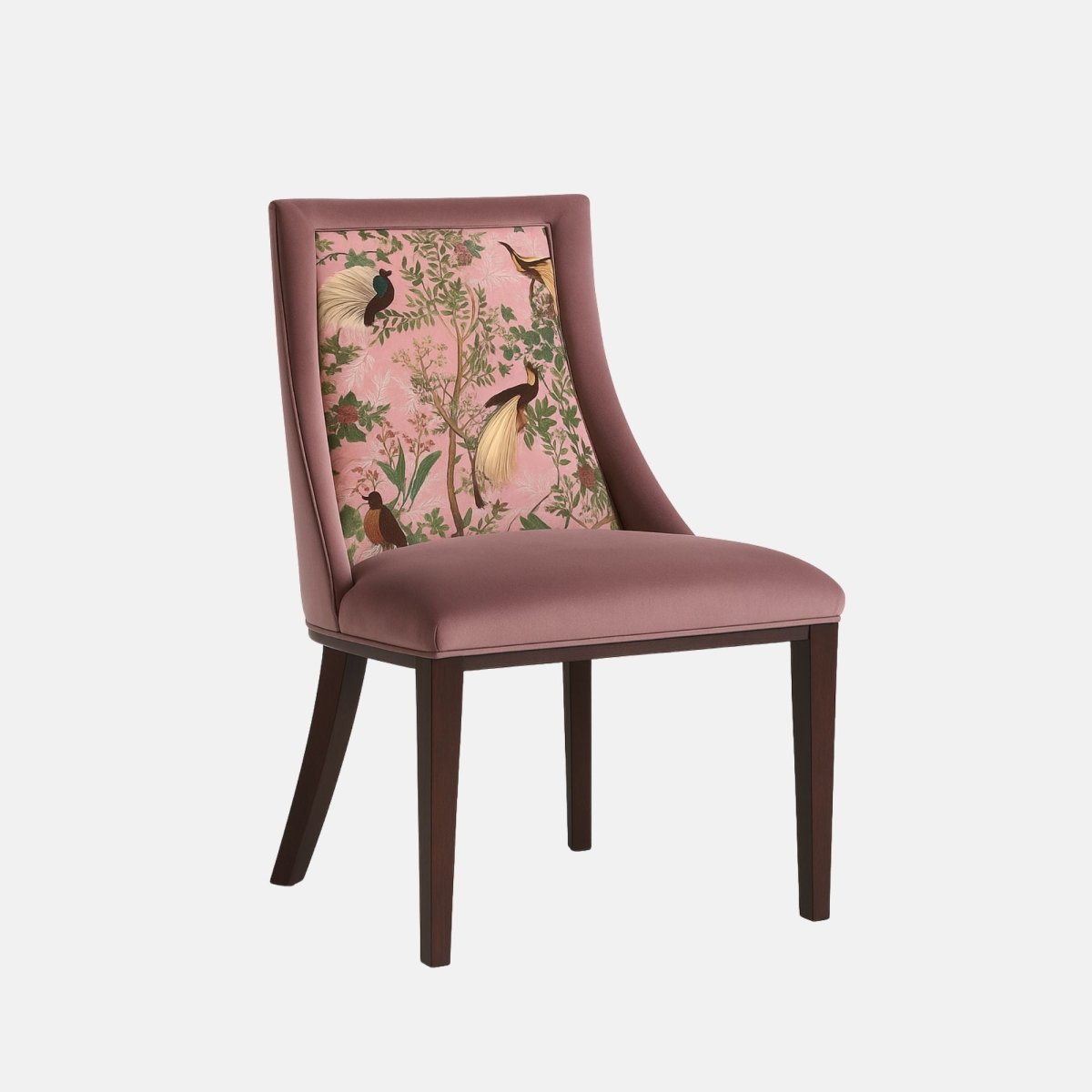 Upholstered dining chair in muted mauve fabric with a cushioned seat and angled backrest, featuring a pink botanical and bird-patterned fabric panel, supported by dark wooden legs, shown on a white background