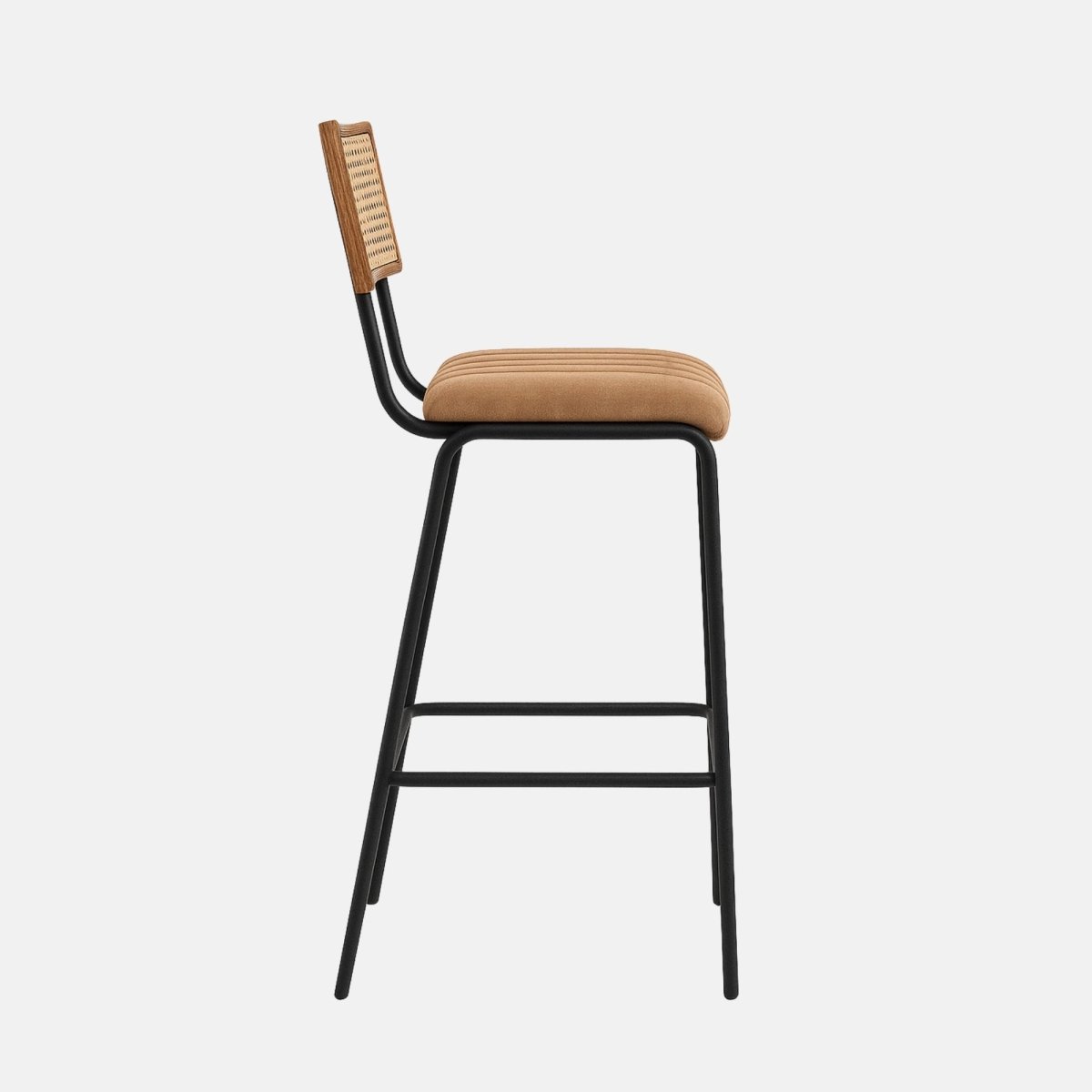 Contemporary bar stool with a woven cane backrest, tan upholstered seat with vertical stitching, and slim black metal frame with footrest.