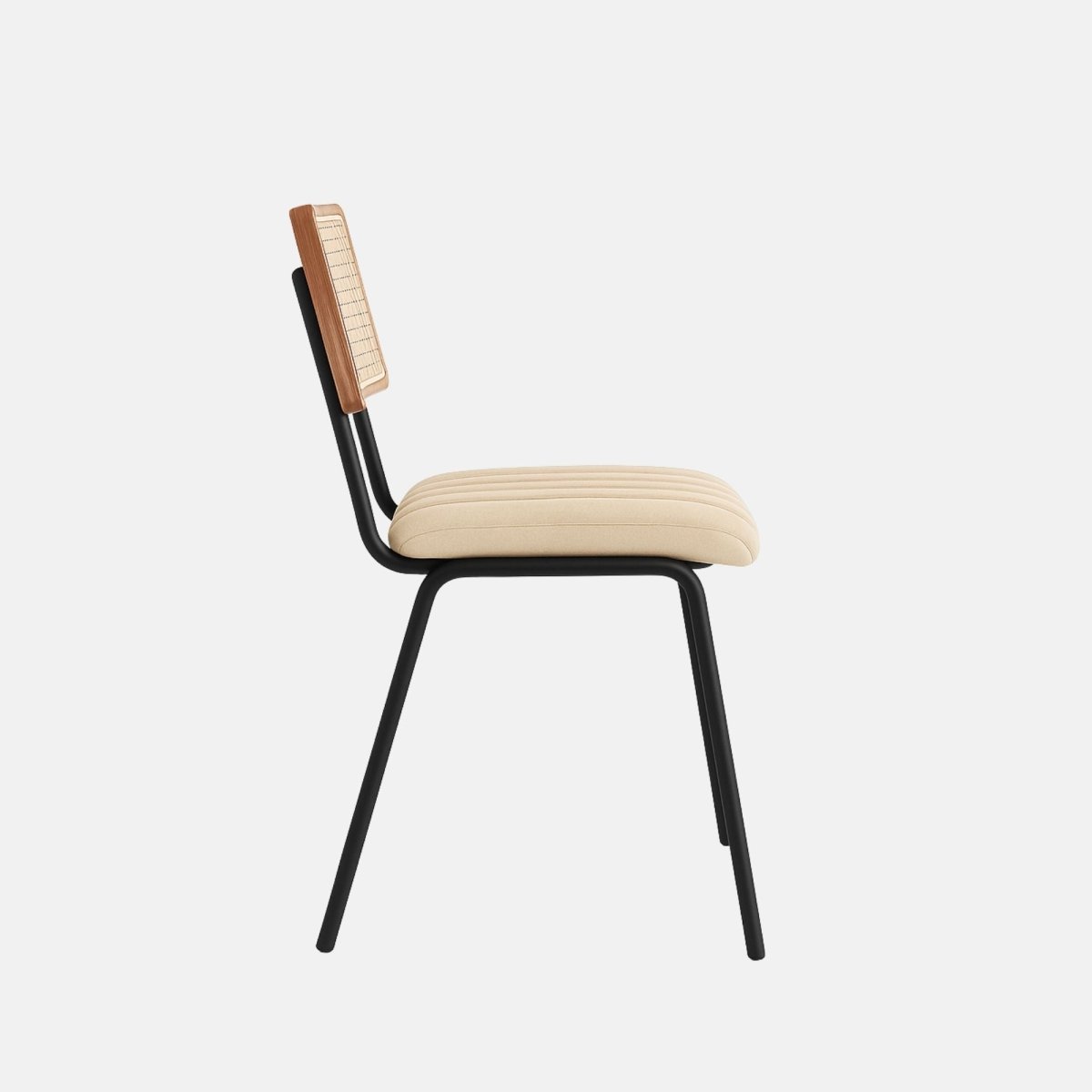 Contemporary accent chair with curved backrest, upholstered in caramel brown velvet with vertical channel tufting, and supported by slim black wooden legs.