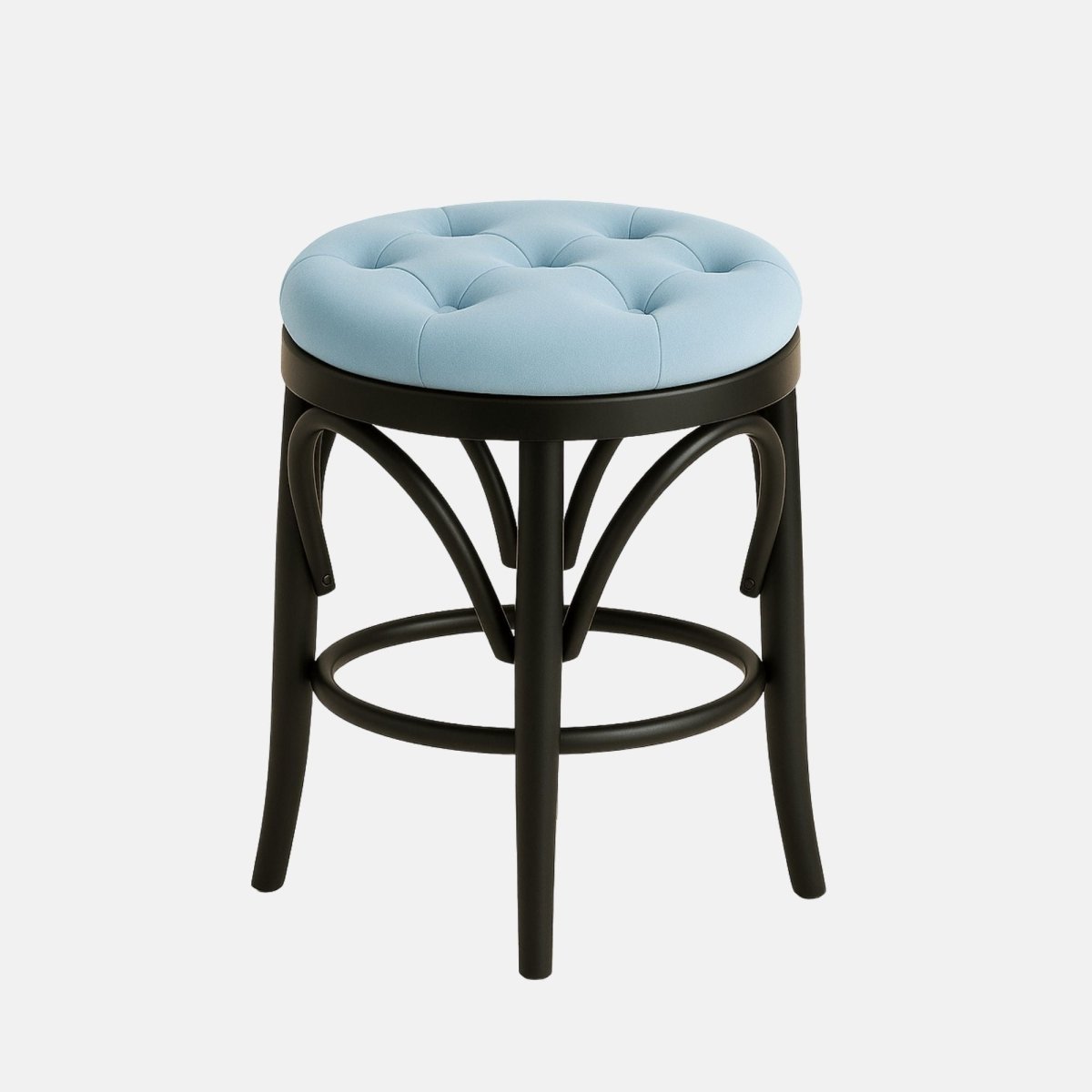 A modern round stool with a tufted light blue cushion seat, black wooden legs, and decorative curved supports with a circular footrest.