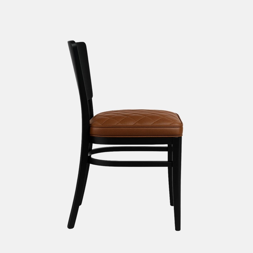 Classic dining chair with a black wooden frame and a quilted brown leather seat cushion, featuring a gently curved backrest and tapered legs, set against a light grey background