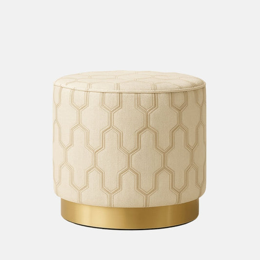 Round beige ottoman with geometric textured upholstery and a gold metallic base.