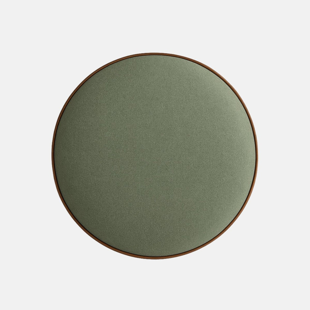 Tudor Low Stool by Lux Seat – compact round stool with a soft sage-green upholstered seat and dark black wooden legs featuring turned details, ideal for lounges, bars, and modern interiors