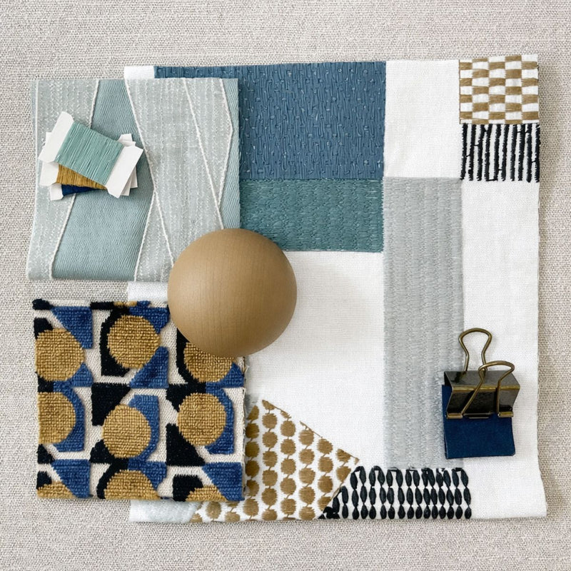 Interior design mood board with upholstery fabric samples, patterns, and textures