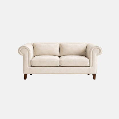 Elegant two-seater sofa with cream upholstery, rolled arms and cushioned seats, featuring wooden legs, ideal for lounges, hotels, and classic interiors