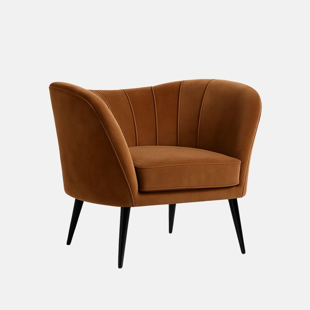 Mid-century style lounge chair with curved channel-tufted backrest, brown velvet upholstery, and slim black tapered legs.