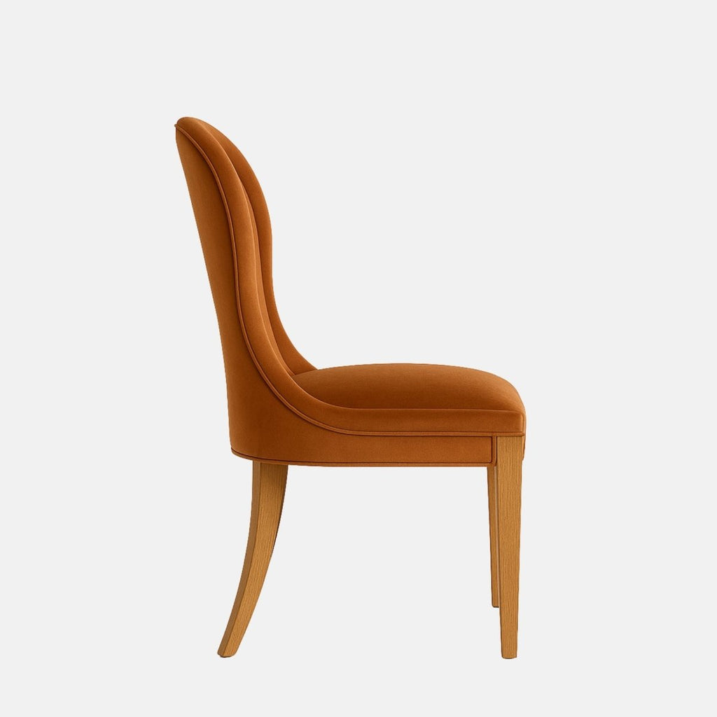Upholstered dining chair in warm rust-orange fabric with a tall, rounded backrest, cushioned seat, and light wooden legs, shown on a white background