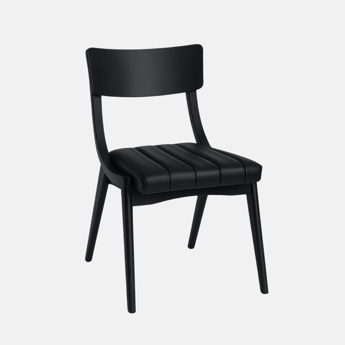 Minimalist black dining chair with a curved wooden backrest and vertically stitched black upholstered seat, supported by sleek black wooden legs, set against a light grey background