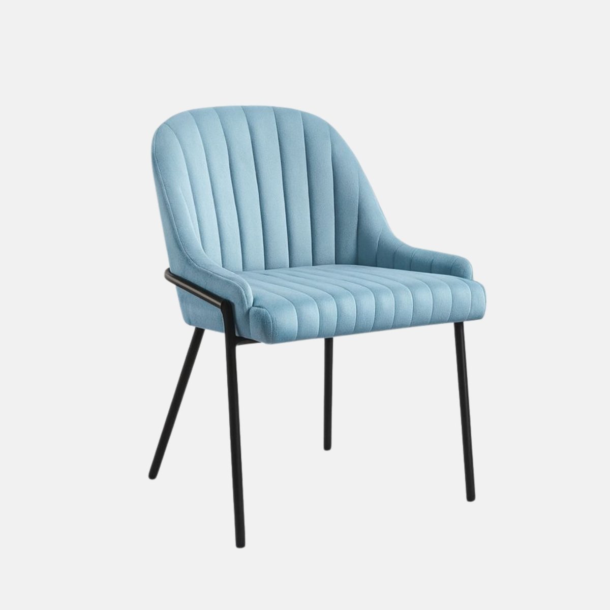 Modern upholstered dining chair in light blue velvet with vertical channel tufting, curved backrest, and slim black metal legs.