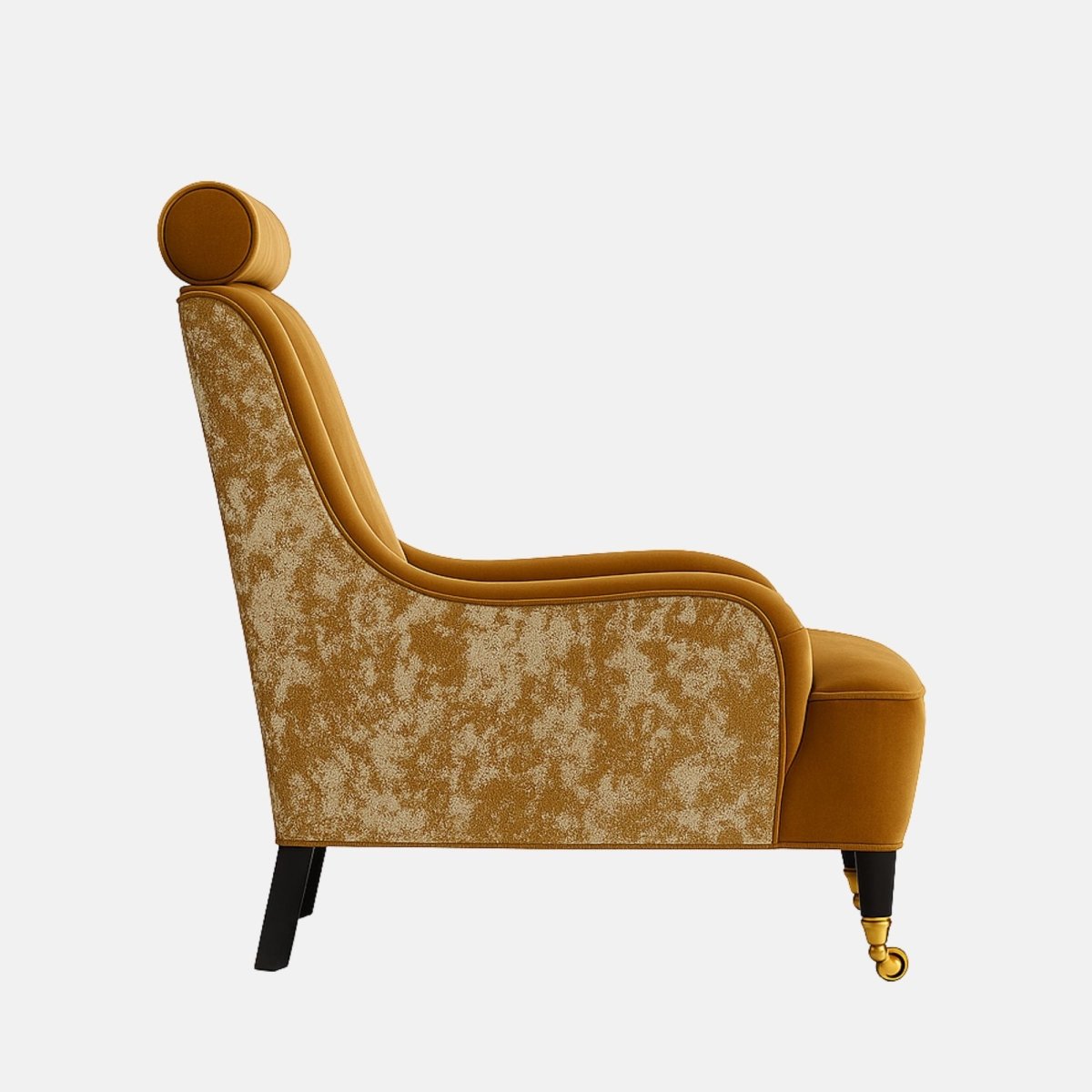 Mustard-gold velvet lounge chair with a cylindrical headrest, gently curved arms, patterned fabric on the outer sides, black legs, and brass front castors.