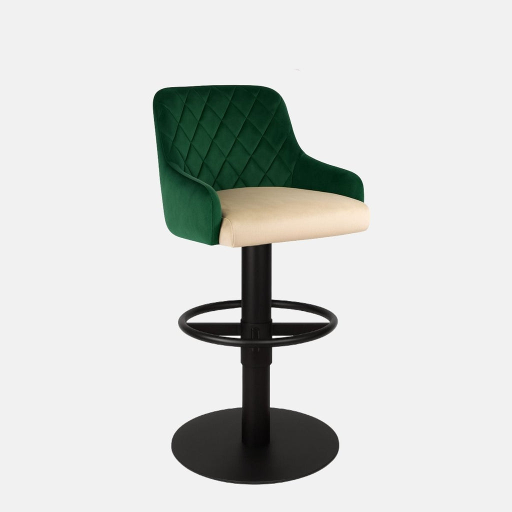 Green velvet 360° swivel bar stool with diamond-quilted backrest and cream upholstered seat on a black powder-coated metal base — bespoke modern counter stool.