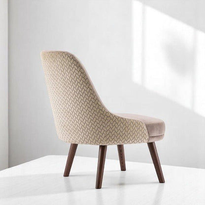 alt="Laid-back grey velvet lounge chair with wide seat and walnut-patterned backrest finish"