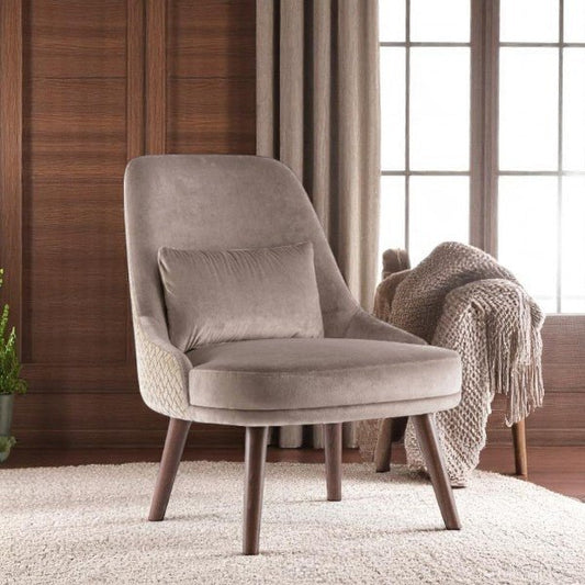 alt="Elegant velvet lounge chair in grey with a spacious design and walnut-style back detailing"